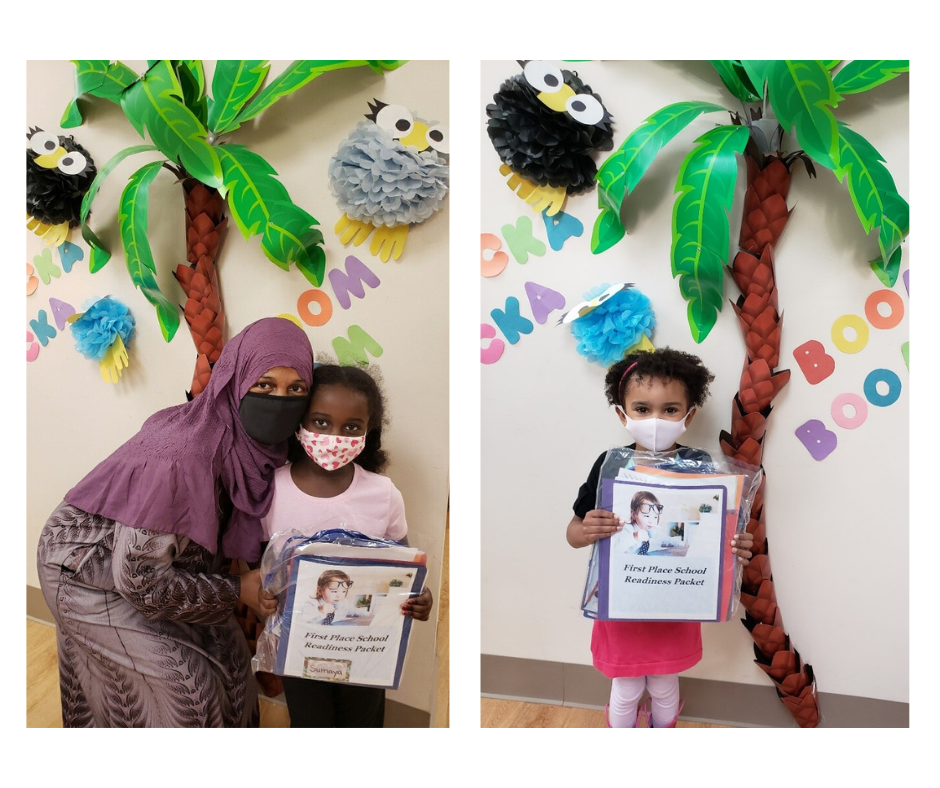 Preschoolers at First Place School pose for a photo with their DEEL home learning kits in September 2020! Pictured on the left is Sumaya with her parent Semera Hussein; on the right is Zainab. 