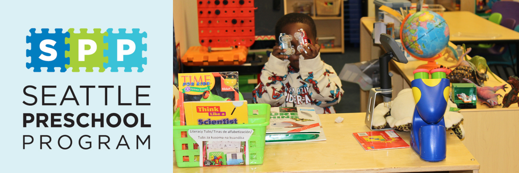 Child with learning activities and books.