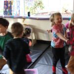 SPP students enjoy learning a new dance together at Hilltop Children's Center.