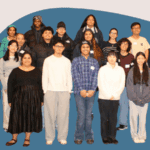 Upward Bound scholars and their families gather with program staff for a group photo at the 2025 Winter Dinner.