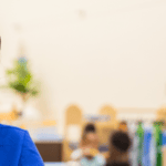 Header image feature a childcare worker with dark hair and blue uniform in an early learning classroom, with logos for Brightspark Early Learning Services and DEEL.